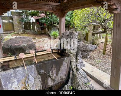Chozuya purification fountain ladles. Traditional Japanese Shinto wash ...