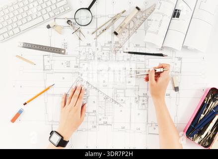 Creating a Design Plan With Tools and Materials on a Table for an Architectural Project Stock Photo