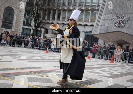 London, England, UK. 17th Feb 2026. Every Shrove Tuesday, Livery members take part in the Pancake Day Race at Guildhall, London. Dressed in elaborate costumes or full regalia, they form teams and race around Guildhall Yard while flipping pancakes, with the winners receiving frying pans and a trophy. Credit:Kiki Streitberger/Ģ����ý Live News Stock Photo