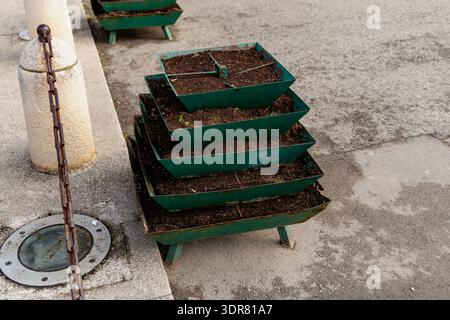 Tiered Green Metal Planter Boxes Outdoors Stock Photo