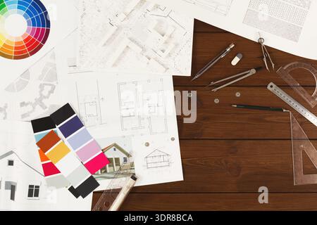Collage of Architectural Plans and Color Samples on Wooden Desk for Design Project Stock Photo