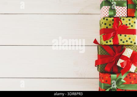 Colorful Gift Boxes Arranged in a Festive Style on a Wooden Surface for a Special Occasion Stock Photo