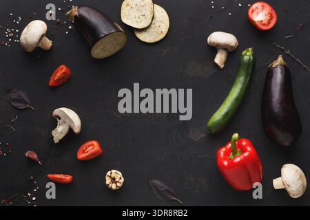 Fresh Vegetables Arranged on Dark Surface for Cooking or Meal Preparation Stock Photo
