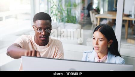People, planning and conversation in office with computer, web design advice or software development. Digital designer, team and point in workplace Stock Photo