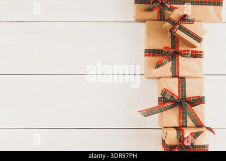 Collection of Gift Boxes Arranged in a Neat Stack on a Wooden Surface for a Celebration Stock Photo
