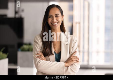 Pretty New Zealander woman posing in modern office Stock Photo