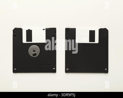 Collection of Black Floppy Disks Arranged in a Collage for Display and Study at a Tech Museum Stock Photo