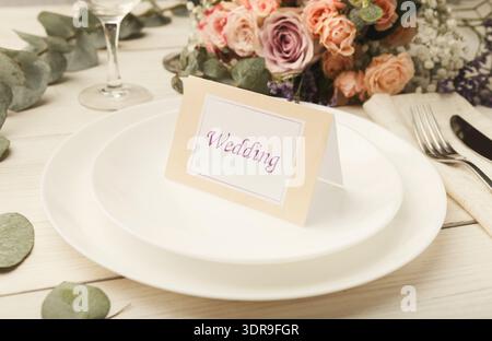 Collection of Wedding Table Settings With Floral Arrangements and Place Cards in a Collage Stock Photo
