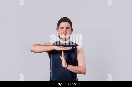 Man making time out gesture, latin guy making time out gesture Stock Photo