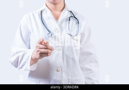 Unrecognizable doctor pointing at the camera. Doctor hands pointing at you isolated, Finger doctor pointing at you Stock Photo