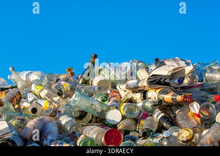 Glass bottles in a recycling plant waiting to be recycled Stock Photo