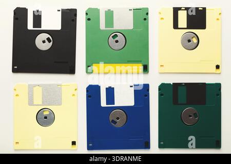 Collection of Vintage Floppy Disks Arranged in a Collage Showcasing Different Colors and Designs Stock Photo