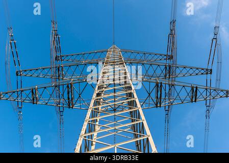 Struts, insulators and cables of the power pole of a high-voltage line or overhead line in bottom vi Stock Photo