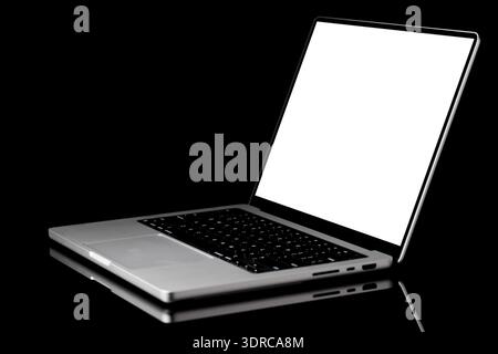 Laptop with a blank screen isolated on a black background Stock Photo