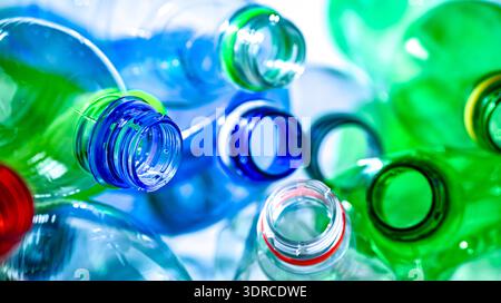 Empty colored drink bottles. Recyclable plastic waste. Stock Photo