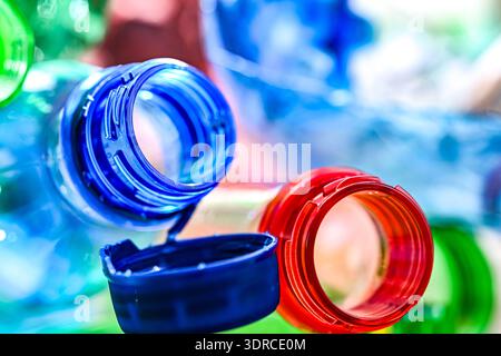 Empty colored drink bottles. Recyclable plastic waste. Stock Photo