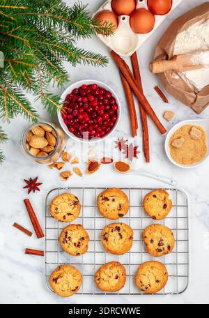 Freshly baked homemade Christmas cookies with cranberries, almonds, white chocolate, cinnamon and st Stock Photo