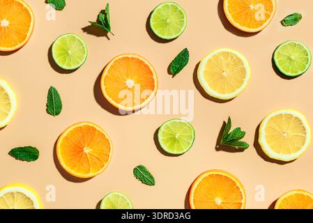 Citrus fruit slices pattern, orange, lemon, lime. Stock Photo