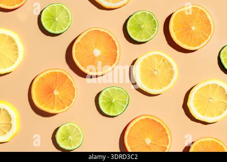 Citrus fruit slices pattern, orange, lemon, lime. Stock Photo