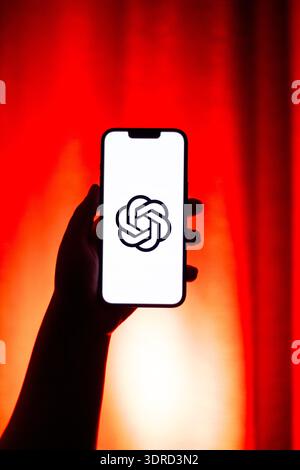 Kaliningrad, Russia - 12.11.2025. Woman holds smartphone showing Chat GPT logo on screen. AI virtual assistant app Stock Photo