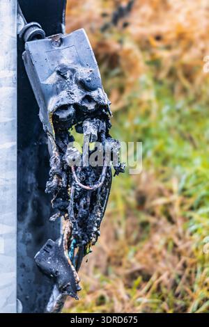 Short circuit in electrical system and its consequences Burnt cable junction box Stock Photo
