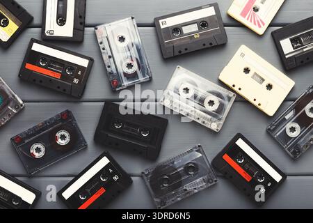Collection of Cassette Tapes Arranged on a Surface in a Random Pattern Stock Photo