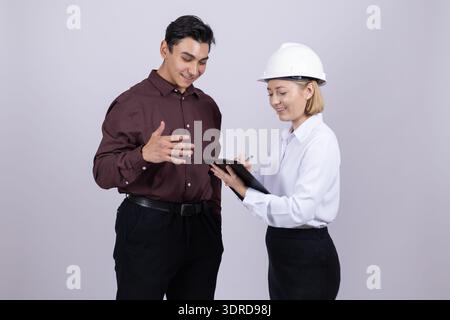 Two engineers using digital tablet for construction planning Stock Photo
