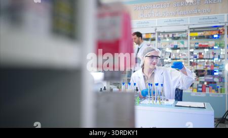 Chemical scientist doing antibiotic trials and testing in the laboratory Stock Photo
