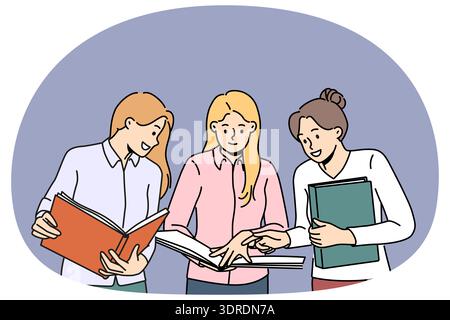 Smiling female colleagues discuss paperwork together Stock Photo