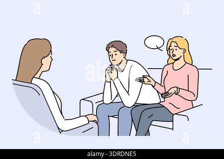 Couple at family therapist in office, sitting on couch talking about problems and quarrels Stock Photo