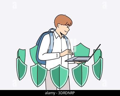 Boy with laptop is learning cyber protect and installing antivirus and standing among green shields Stock Photo