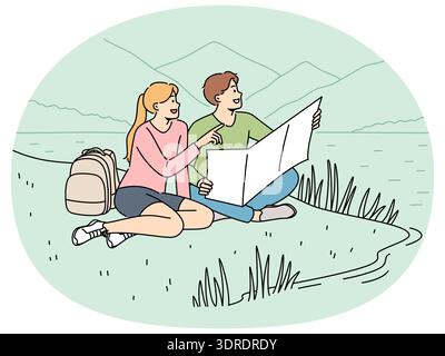 Happy couple of travelers sitting on lawn during hike in national park with lake and holding map Stock Photo
