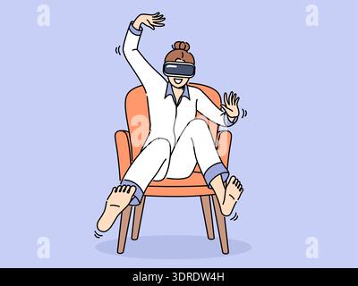 Woman wearing VR headset sits in chair and waves arms and legs, being immersed in virtual reality Stock Photo