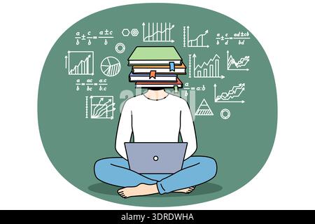 School student boy uses laptop sitting on floor, with laptop on lap and books instead of head Stock Photo