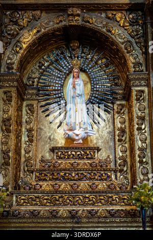 Madeira, Portugal - 27.01.2026: Golden Virgin Mary statue in church. Stock Photo