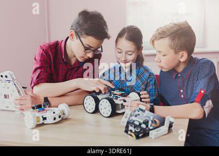 Students Engage in Robotics Project at School During Afternoon Study Time Stock Photo