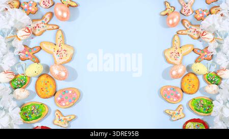 Happy Easter concept, spring card, composition with flowers, cookies and eggs on a gentle background. Holiday minimal concept, h Stock Photo