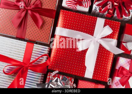 Christmas gift boxes on wooden table Stock Photo
