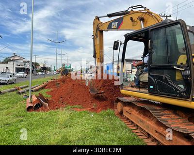 The photograph captures Saev Ambiental initiating the replacement of the water pipeline linking Poço Norte to the Water Treatment Station (ETA) in Votuporanga on May 9, 2023. Workers are installing new pipes, securing connections, and supervising water flow. The municipal project, under ASCOM Prefeitura de Votuporanga, focuses on improving water supply infrastructure, ensuring reliability, public health, and efficiency in water delivery services for the local community. Stock Photo