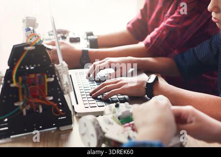 Students Build Robots and Code Programs During a Workshop at a Community Center in the Afternoon Stock Photo