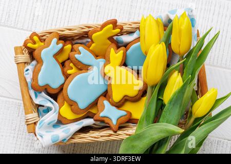 Easter Bunny-Shaped Gingerbread Cookies, Yellow Tulips Stock Photo