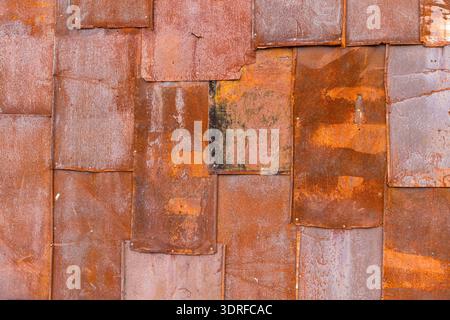 Texture background wall sheet metal plates rusty Stock Photo