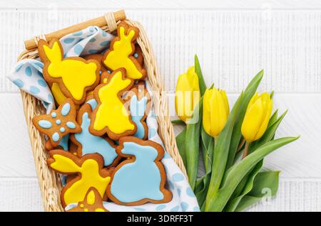 Easter Bunny-Shaped Gingerbread Cookies, Yellow Tulips Stock Photo