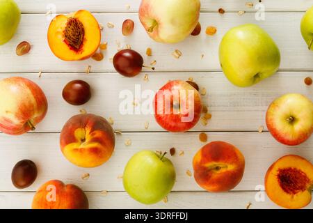 Collection of Various Fruits on a Wooden Table Arranged in a Colorful Display Stock Photo