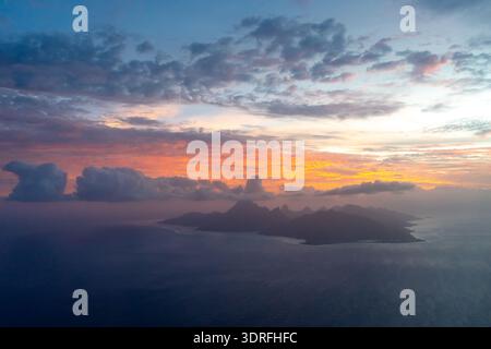 Aerial view of Moorea island at sunset, French Polynesia Stock Photo