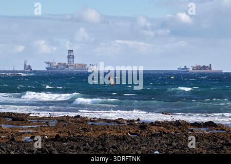 view of waves in the sea and windy surface from el medano towards the port of granadilla tenerife canary islands spain Stock Photo