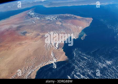 The Strait of Hormuz OMAN. STRAIT OF HORMUZ , GULF OF OMAN , AL HAJAR MOUNTAINS , WAHIBA SANDS DESERT, OMAN, RUB' AL KHALI DESERT, ARABIAN SEA  Photograph taken from the International Space Station on 26 November 2019   An optimised version of an original NASA image: Credit NASA Stock Photo