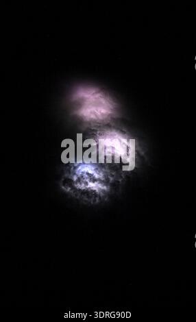 Lightning strikes illuminate the stormy cloud tops above the Democratic Republic of the Congo in this photograph, taken at approximately 9:58 p.m. local time from the International Space Station as it orbited 259 miles above Earth.  A photograph taken from the International Space Station on 28 july 2025.  An optimised version of an original NASA image: Credit NASA/NAyers Stock Photo
