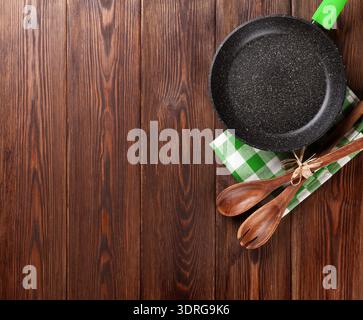Cooking utensil on wooden table Stock Photo