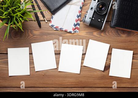 Blank photo frames, camera and supplies Stock Photo